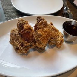 Chicken wings with sauce on the side -- good flavor but dry
