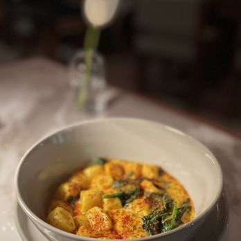 Juliet - a bowl of food on a table - French Near Me - Culver City, California