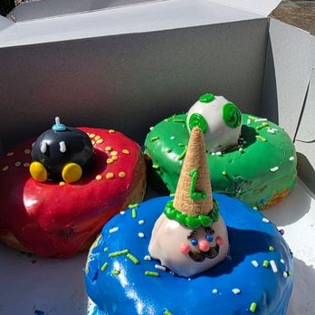 Moonbridge Doughnut Studio - Mario themed: Bob-omb, Yoshis egg, Luigi - Donuts Near Me - Long Beach, California Moonbridge Doughnut Studio - Mario themed: Bob-omb, Yoshis egg, Luigi - Donuts Near Me - Long Beach, California