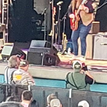 PNC Pavilion - a band playing on stage - Music Venues Near Me - Cincinnati, Ohio