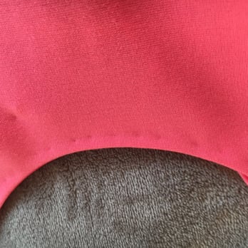 Enviro Cleaners - The stitching damage around the neck is visible from the front of the dress too - Shoe Shine Near Me - Reston, Virginia