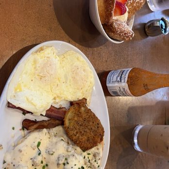 Ruby Slipper Central Business District - Biscuits and gravy with a fried green tomato and the berry beignets! - Breakfast & Brunch Near Me - New Orleans, Louisiana Ruby Slipper Central Business District - Biscuits and gravy with a fried green tomato and the berry beignets! - Breakfast & Brunch Near Me - New Orleans, Louisiana
