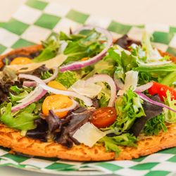 Boosters Bar And Grill - Garden Flatbread
Cauliflower crust, sweet chili bourbon sauce and mozzarella, topped with Parmesan and greens, tossed with light lime honey