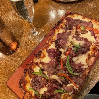 The Quarry Restaurant - Philly cheesesteaks flatbread - American Near Me - Mason City, Iowa The Quarry Restaurant - Philly cheesesteaks flatbread - American Near Me - Mason City, Iowa