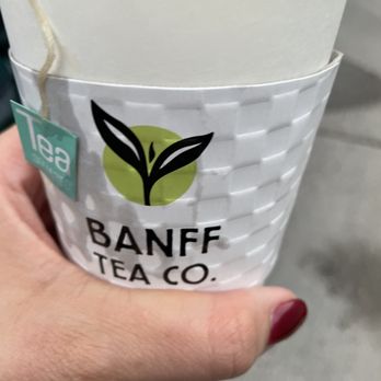 Banff Tea - a hand holding a cup of tea - Coffee & Tea Supplies Near Me - Banff, Alberta