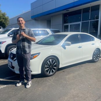 American Chevrolet - Me with my new car. - Auto Repair Near Me - Modesto, California American Chevrolet - Me with my new car. - Auto Repair Near Me - Modesto, California