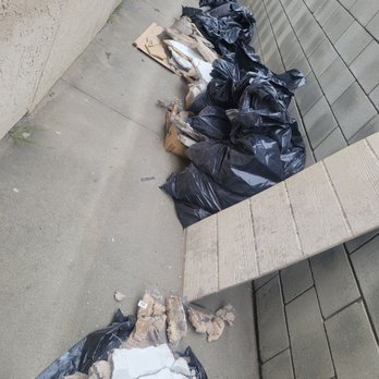 Rays Demo & Construction - Old shower tiles and concrete. - Junk Removal & Hauling Near Me Rays Demo & Construction - Old shower tiles and concrete. - Junk Removal & Hauling Near Me