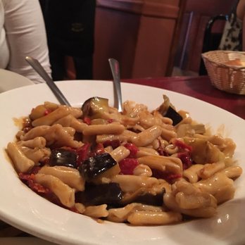 Benito One - Cavatappi with sun dried tomato, artichoke hearts and eggplant. - Italian Near Me - New York, New York Benito One - Cavatappi with sun dried tomato, artichoke hearts and eggplant. - Italian Near Me - New York, New York