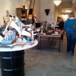 Interior shot of the store. Note the fun wine glass chandeliers and sock monkey!