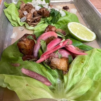 Bartaco - Orlando - Pork belly taco on lettuce and a Carnitas taco on lettuce - Tacos Near Me - Orlando, Florida Bartaco - Orlando - Pork belly taco on lettuce and a Carnitas taco on lettuce - Tacos Near Me - Orlando, Florida