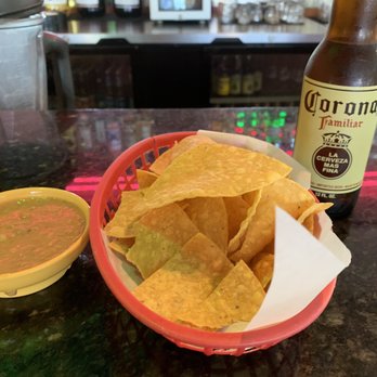 Nachos and Beer - Bean dip and chips... they have a multi salsa bar also that is self service - Mexican Near Me - Asheville, North Carolina