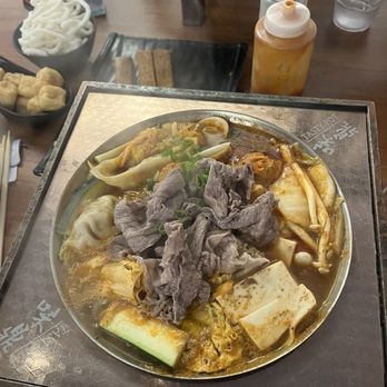 Tasty Pot - Kimchi dumpling soup. Subbed broth with Taiwanese base. - Hot Pot Near Me - Glendale, Arizona Tasty Pot - Kimchi dumpling soup. Subbed broth with Taiwanese base. - Hot Pot Near Me - Glendale, Arizona
