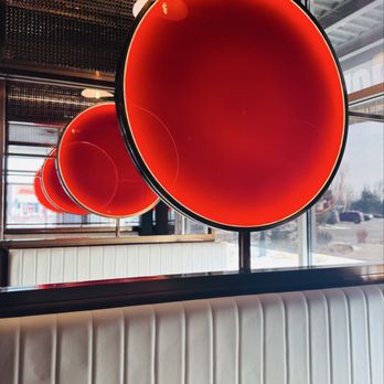 Miya Moon - Red "moons" separate the booths - Chinese Near Me - Broomfield, Colorado