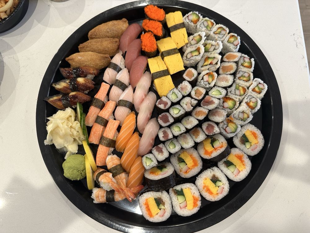 Sushi Kanpai Carryout Logo