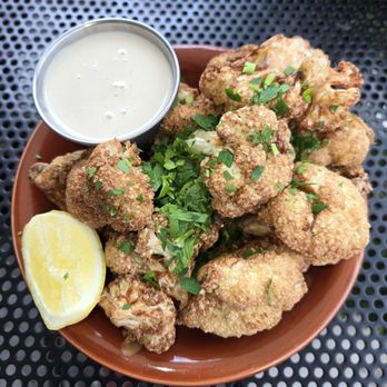 Laziz Kitchen - Lightly fried cauliflower with salt, pepper and cumin with tahini dip. - Middle Eastern Near Me - Salt Lake City, Utah