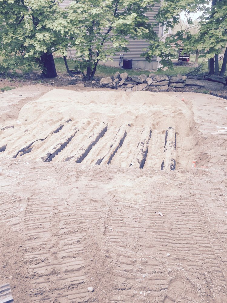 Slide of EmRay Excavating