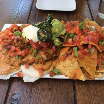SunCafe - The amazing nachos, 1/2 jicama chips, 1/2 baked tortilla chips. - Vegan Near Me - Studio City, California