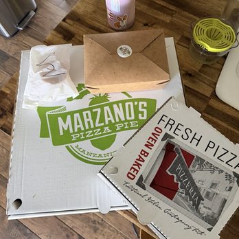 Marzano's Pizza Pie - Packaging - Pizza Near Me - Manzanita, Oregon Marzano's Pizza Pie - Packaging - Pizza Near Me - Manzanita, Oregon