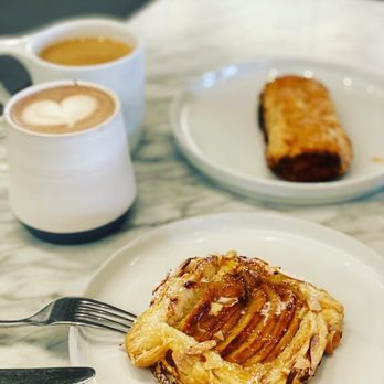 Small Victory Bakery - a pastry and a cup of coffee - Coffee & Tea Near Me - Vancouver, British Columbia