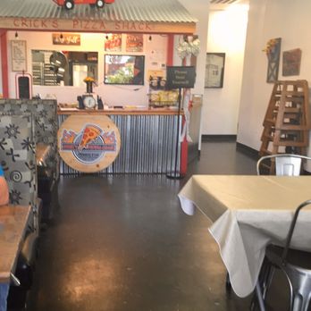 Crick’s Pizza Shack - a man sitting at a table - Pizza Near Me - Princeton, North Carolina Crick’s Pizza Shack - a man sitting at a table - Pizza Near Me - Princeton, North Carolina