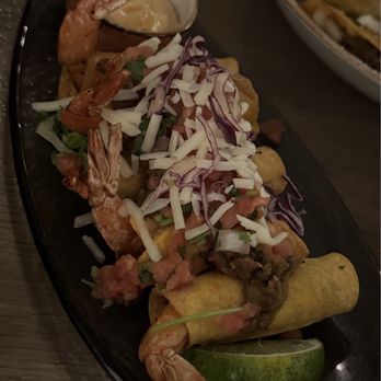 Caló Kitchen + Tequila - Shrimp Taquitos appetizer $23 - Cocktail Bars Near Me - Costa Mesa, California Caló Kitchen + Tequila - Shrimp Taquitos appetizer $23 - Cocktail Bars Near Me - Costa Mesa, California