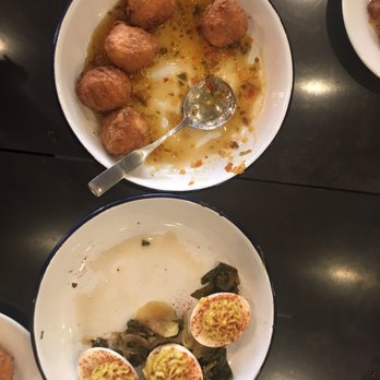 The Stave - Deviled eggs with pickled greens and fried cheese grits balls with a jalapeño jelly. - Southern Near Me - Frankfort, Kentucky The Stave - Deviled eggs with pickled greens and fried cheese grits balls with a jalapeño jelly. - Southern Near Me - Frankfort, Kentucky