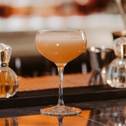 The Curtain Club - Discover The Curtain Club -- A haven of exquisitely crafted cocktails, champagne, renowned longdrinks, and fine spirits.