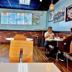 Cute little halal cafe only 7 tables inside menu on the wall OuiOui.