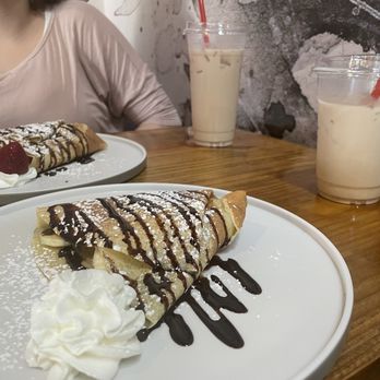 60 Beans Coffee - Crepes:  Strawberry & cream (far), Banana, peanut butter, Nutella (near) Drinks: Iced chai latte (both) - Coffee & Tea Near Me - Jefferson City, Tennessee