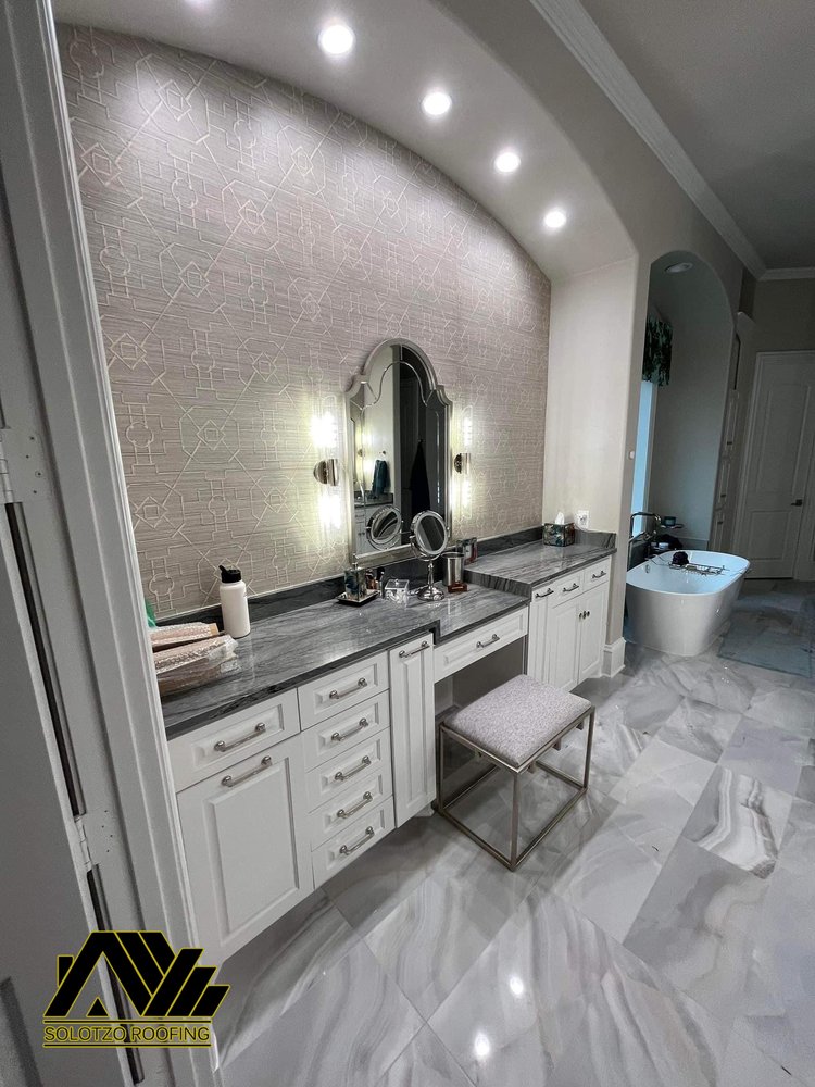 Slide of Solotzo Roofing