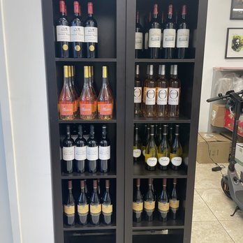 Café de Paris - wine rack - Sandwiches Near Me - Boynton Beach, Florida Café de Paris - wine rack - Sandwiches Near Me - Boynton Beach, Florida