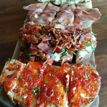 Postino Central - Bruschetta-Warm Artichoke Spread,Prosciutto w/Figs & Mascarpone, Burrata, Bacon,Arugula &Tomato,Sweet & Spicy Pepper Jam w/Goat Cheese.Yum! - Wine Bars Near Me - Phoenix, Arizona Postino Central - Bruschetta-Warm Artichoke Spread,Prosciutto w/Figs & Mascarpone, Burrata, Bacon,Arugula &Tomato,Sweet & Spicy Pepper Jam w/Goat Cheese.Yum! - Wine Bars Near Me - Phoenix, Arizona