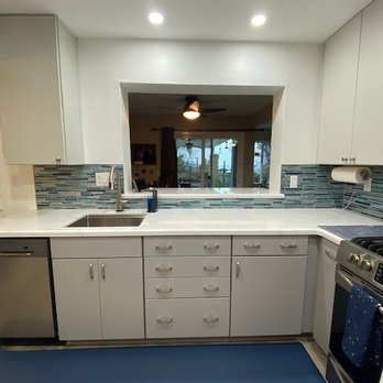Toltec Remodeling & Construction - Passthrough lowered and countertop extended to create a bar on the other side. - General Contractors Near Me Toltec Remodeling & Construction - Passthrough lowered and countertop extended to create a bar on the other side. - General Contractors Near Me