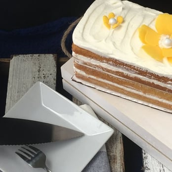 Martinelli Sweets - a piece of cake on a plate - Custom Cakes Near Me