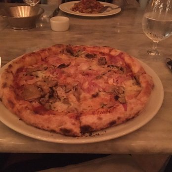 Cecconi's Miami Beach - porchetta, mushroom, and taleggio pizza. Crust and ingredients were great but the middle of the pizza was very soggy. - Italian Near Me - Miami Beach, Florida