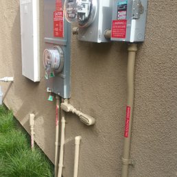 Exterior view of metering and conduit Exterior view of metering and conduit