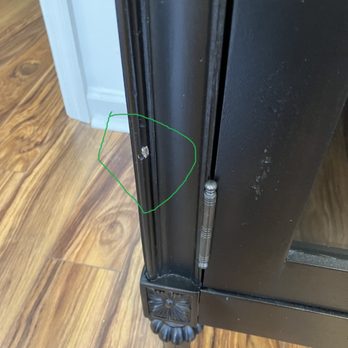 Stone Interiors South Carolina - Damage to TV console caused by installers - Kitchen & Bath Near Me - Gaston, South Carolina