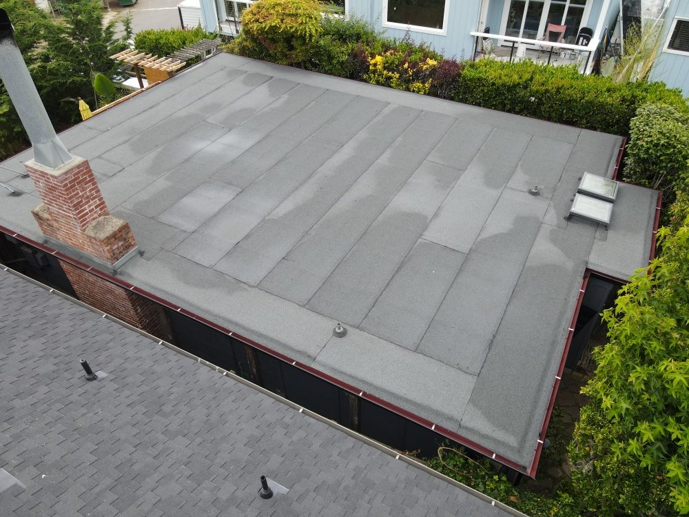 Slide of Real Roofing