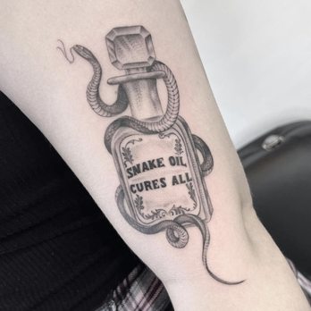 Classic Touch Tattoos - Snake oil bottle by @mattsmithtattoos - Tattoo Near Me - Venice, California Classic Touch Tattoos - Snake oil bottle by @mattsmithtattoos - Tattoo Near Me - Venice, California