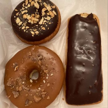 Sweet Daisies Bakery - Chocolate Frosted Cake w/Peanuts, Vanilla Cream Filled Long John, Maple Iced w/Toffee Crumble - Custom Cakes Near Me - Aurora, Illinois Sweet Daisies Bakery - Chocolate Frosted Cake w/Peanuts, Vanilla Cream Filled Long John, Maple Iced w/Toffee Crumble - Custom Cakes Near Me - Aurora, Illinois