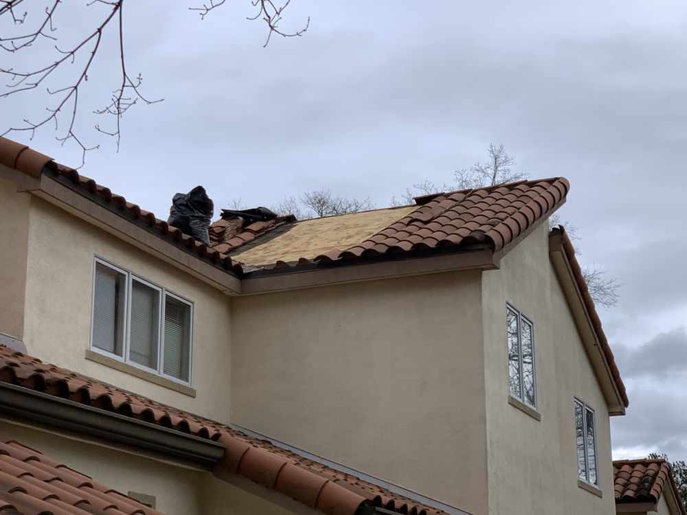 Slide of J & J Roofing