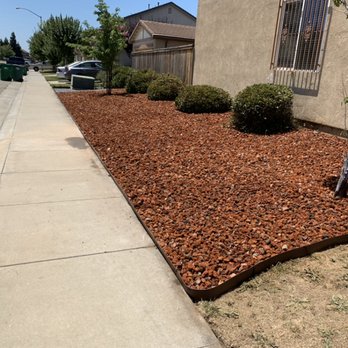 Chavez Lawn Care - a mulch bed in front of a house - Lawn Services Near Me Chavez Lawn Care - a mulch bed in front of a house - Lawn Services Near Me