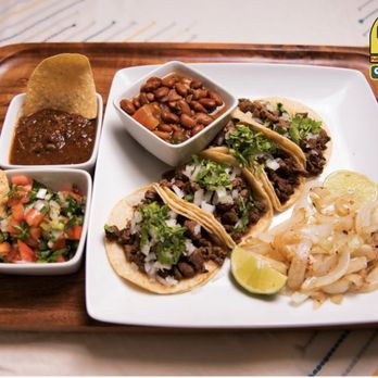 Pollo Feliz Express - a plate of tacos and chips - Mexican Near Me - Laredo, Texas