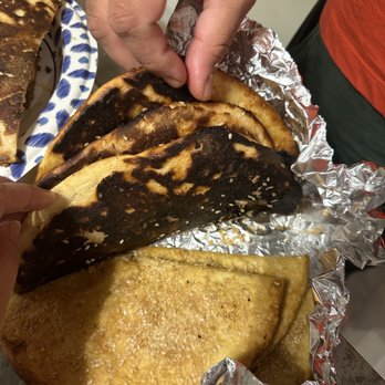 Halal Kabob House - Burnt roghni naan. Awful. We could not eat it. - Halal Near Me - Inglewood, California