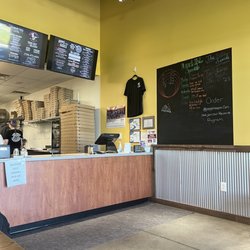Peppino's Pizza - Counter with specials board