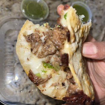 Rey Taco - Inside of the dry mulita, falling apart after two bites - Mexican Near Me - Tucker, Georgia Rey Taco - Inside of the dry mulita, falling apart after two bites - Mexican Near Me - Tucker, Georgia