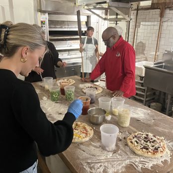 The Mill - Making pizza during the cooking class - Coffee & Tea Near Me - San Francisco, California The Mill - Making pizza during the cooking class - Coffee & Tea Near Me - San Francisco, California