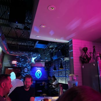 La Viuda Negra - a group of people sitting at a bar - Bars Near Me - Dallas, Texas La Viuda Negra - a group of people sitting at a bar - Bars Near Me - Dallas, Texas