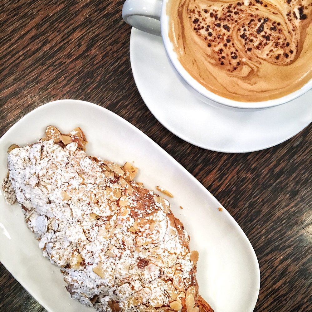 Thierry - Almond croissant and a mocha with their own molten chocolate added - Patisserie/Cake Shop Near Me - Vancouver, British Columbia