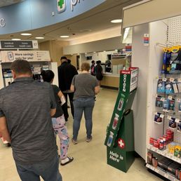 People waiting for the slowest moving pharmacy ever